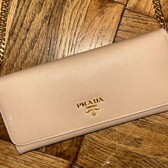 Prada Accessories - - Prada wallet and chain.